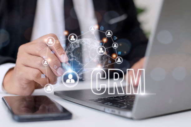 istock CRM Customer Relationship Management for business sales marketing system concept presented in futuristic graphic interface of service application to support CRM database analysis. 1449973744