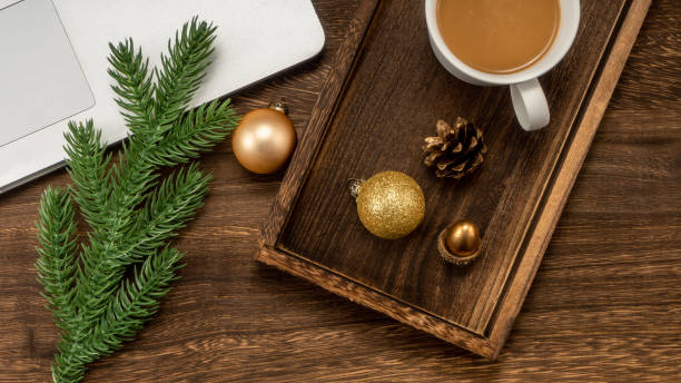 istock Christmas background with Laptop, coffee, fir branches, decorations. 1449978827