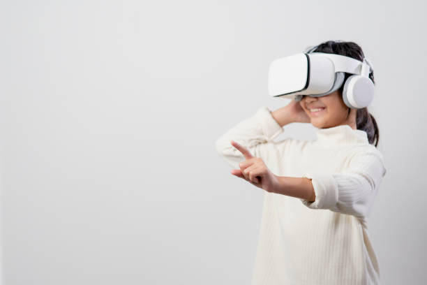 istock Asian little girl with virtual reality headset. Innovation technology and education concept 1449979077