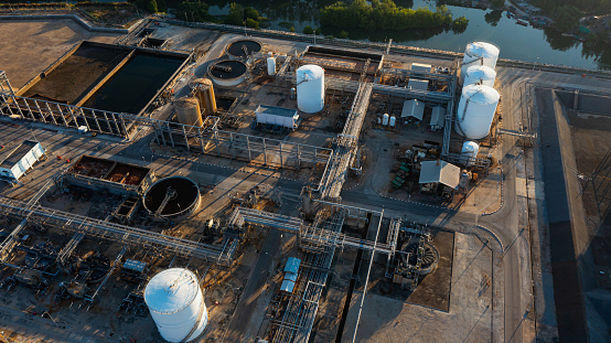 Aerial view or oil terminal is industrial facility for storage tank of oil and LPG Petrochemical. oil manufacturing products ready for transport and business transportation, LPG Tank, CNG tank