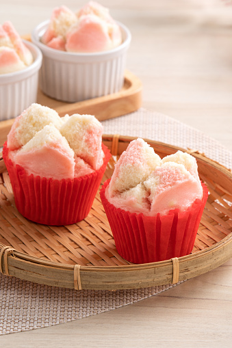Cute tasty fresh traditional Chinese steamed sponge cake - Fa Gao, for lunar new year festival celebration food in pink and white color.