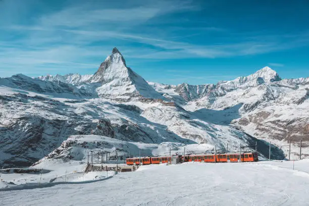 Matterhorn, Switzerland, Winter tourist train with Matterhorn mountain in the background, Zermatt