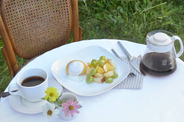 Fruits Plate & A Cup of Coffee on the Table/Outdoors