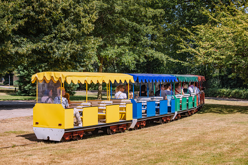 30 July 2022, Cologne, Germany: Children and adult railway in the Rheinpark as an attraction
