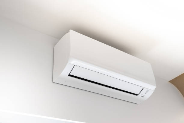 istock CloseUp White air condition on white wall background in house 1449999020