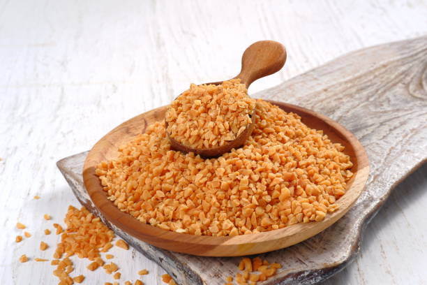 istock Heap of roasted crushed peanuts 1450002902