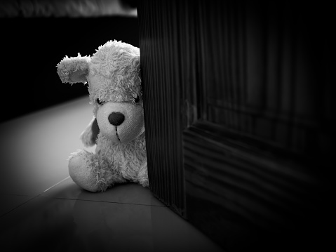 Broken Heart or Sad Concept,Toy Bear Sitting in Room Black and white Photography with Free Space,Old Doll Teddy Bear in Home,Symbol for Sad,Sory,Regret,Lost,Scrary,Baby Abandoned,Stress,Love Valentine