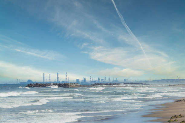 White sand beach and modern urban waterfront skyline copy space scene