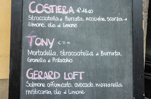 Mortadella on Menu at Florence in Tuscany, Italy, among other foodstuffs.