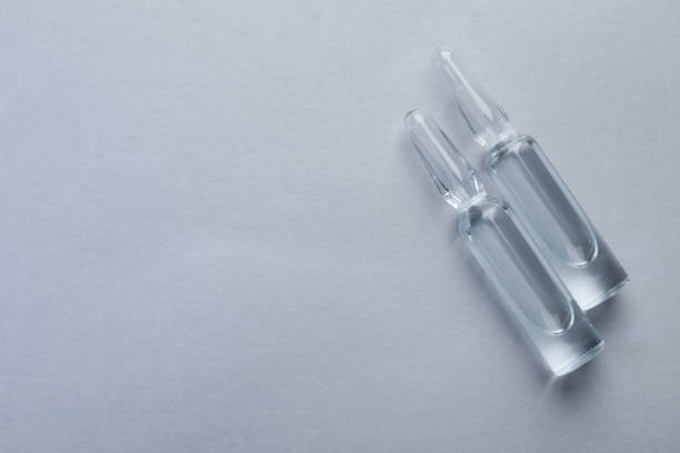 Injection vial and ampule show medical background