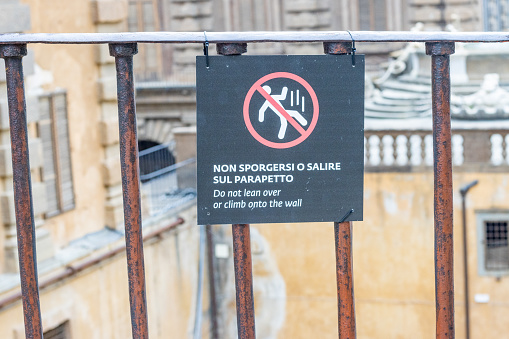 Do Not Climb onto Wall Sign at Boboli Gardens of Florence in Tuscany, Italy