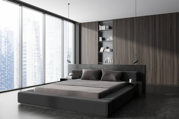 istock Dark bedroom interior with bed and decoration, panoramic window 1450022071