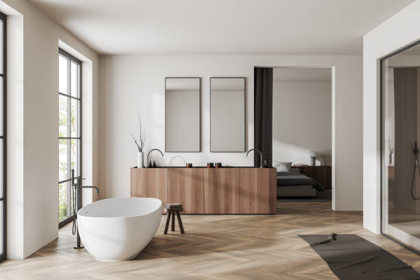 istock Cozy bedroom interior with relaxing and bathing area, panoramic window 1450023710