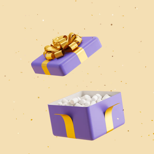 istock Open box with gold ribbons and confetti on beige background 1450023736