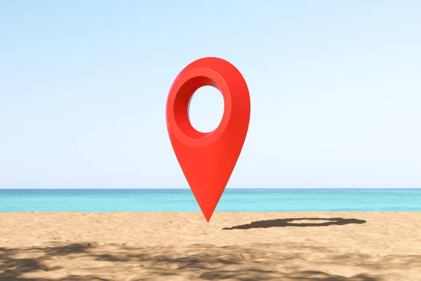 istock Big red geo tag at the sand beach, sea view 1450024544