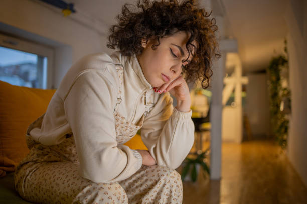 istock Young woman suffering from pain 1450029311