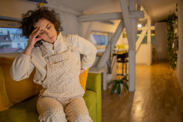 istock Young woman suffering from pain 1450029339