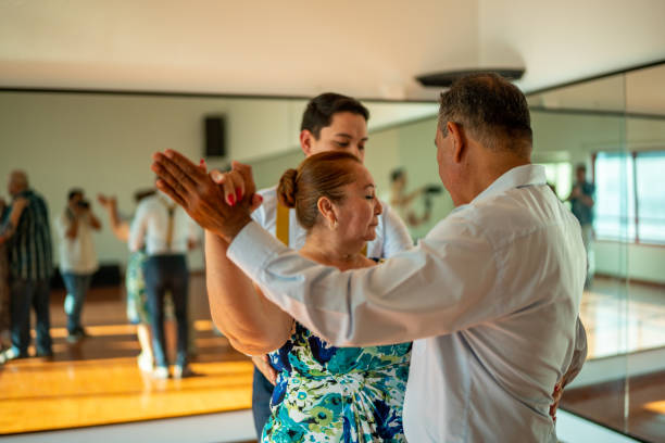 istock Senior couple dancing at dance studio 1450033759