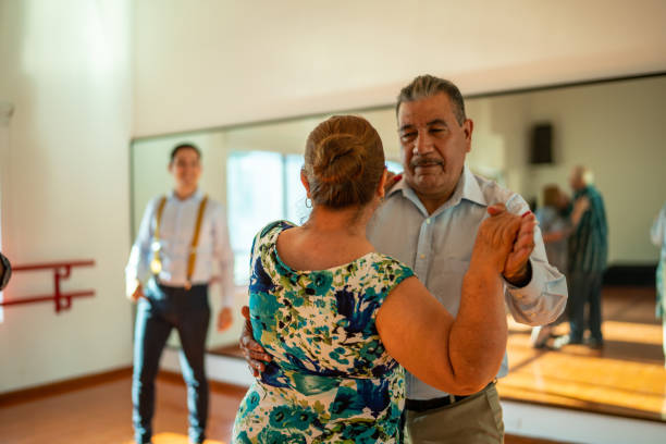 istock Senior couple dancing at dance studio 1450033771