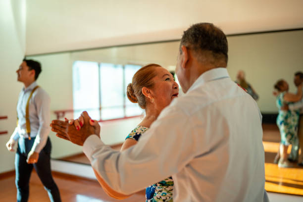 istock Senior couple dancing at dance studio 1450033772