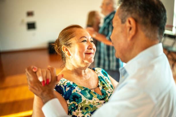 istock Senior couple dancing at dance studio 1450034083