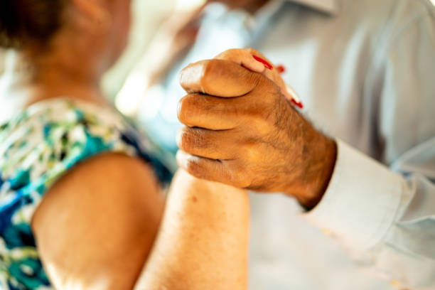 istock Close-up of senior couple dancing at a dance studio 1450034206
