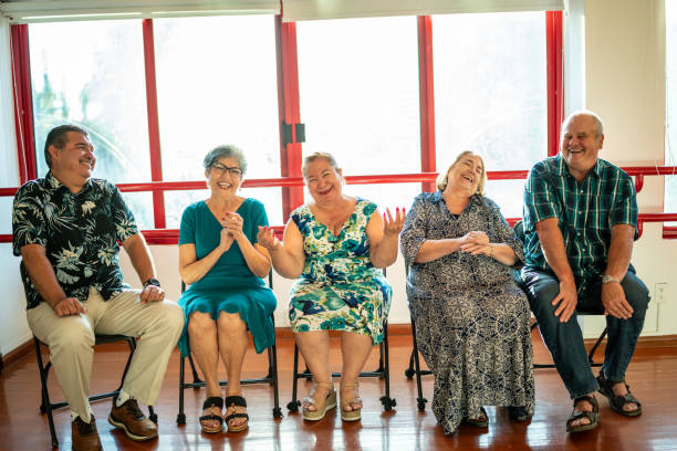 Senior friends talking at the dance studio