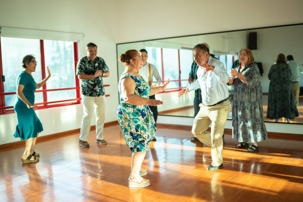 istock Mature couple dancing at a dance studio 1450035404