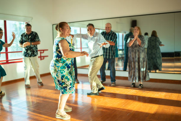 istock Mature couple dancing at a dance studio 1450035405