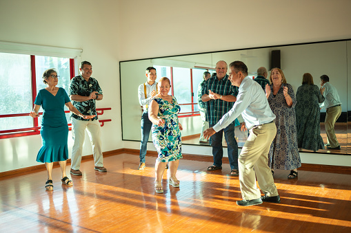 Mature couple dancing at a dance studio