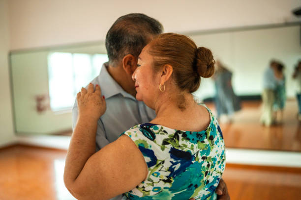 istock Senior couple dancing at a dance studio 1450035983