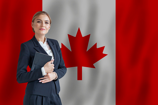 Canadian businesswoman on the flag of Canada digital  nomad, business, startup concept