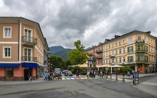 Bad Ischl, Austria, July 8, 2022: View of the Wirerstrasse street in the center of this town under summer cloudy sky. Bad Ischl in Upper Austria is known also as the place where the Austrian Emperor Franz Joseph I had a villa (not pictured).