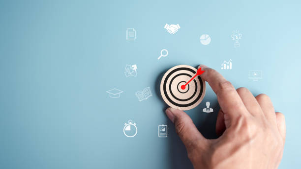 istock Aiming target dashboard on wooden circle for planning development leadership and customer target group concept. 1450040807