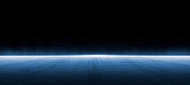 istock A dark empty street, dark blue background, an empty dark scene, neon light, spotlights The asphalt floor and studio room with smoke float up the interior texture. night view 1450044851