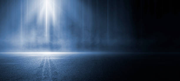 istock A dark empty street, dark blue background, an empty dark scene, neon light, spotlights The asphalt floor and studio room with smoke float up the interior texture. night view 1450044864