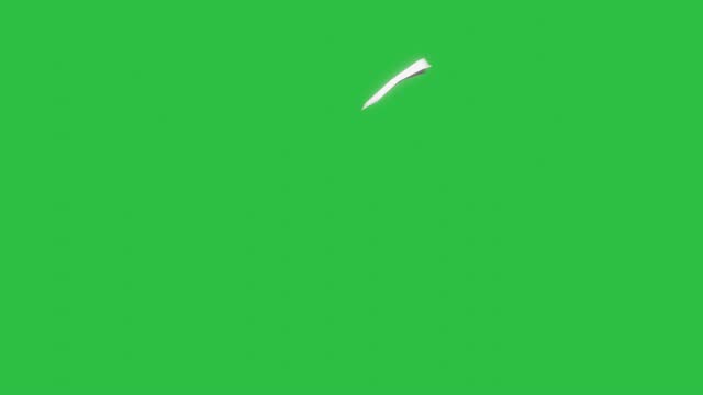 Paper plane flying from left to right on green screen