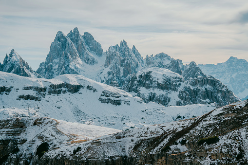 Scenic view of snow-covered Dolomites in winter at sunset