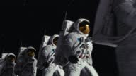 istock Astronauts walking on the lunar surface. Abstract pop art 4K CGI. 1450058045