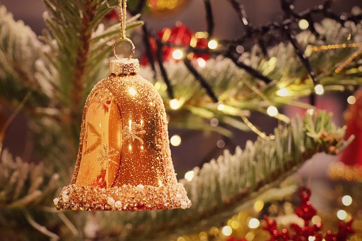 Christmas tree with decoration, golden bell. Selective focus with vintage style picture. Christmas background concept.