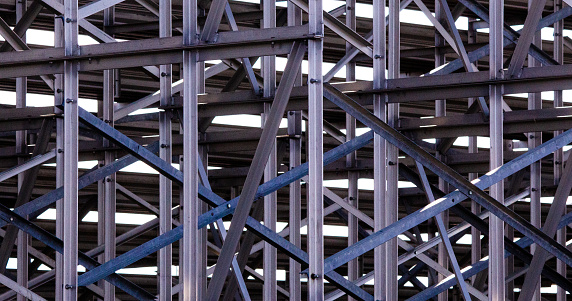 The various building materials and designs of grandstands at a sporting venue in Edmonton, Alberta, Canada, play with the evening light.