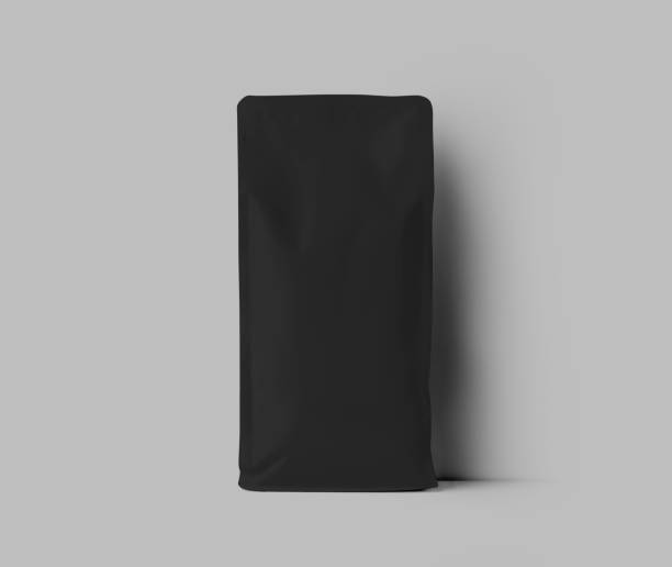 istock Mockup of a black coffee pouch with transparent inserts on the sides, front view, bag for coffee, espresso, product aroma. 1450066126