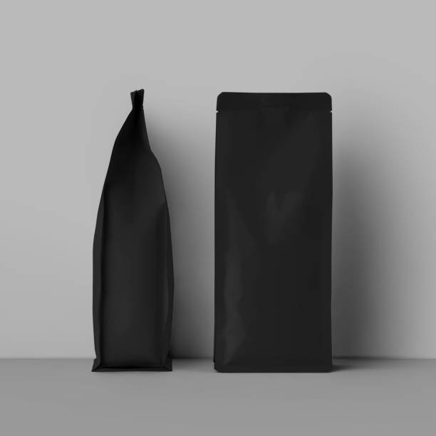 istock Mockup black pouch gusset for aroma products, tea, coffee, front, side view, isolated on background. 1450066271
