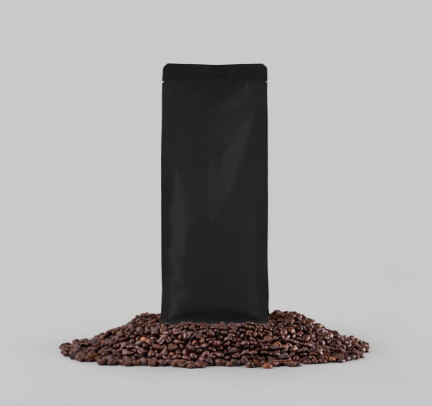 istock Template black coffee pouch gusset with degassing valve, presentation on coffee beans, isolated on background. 1450066437