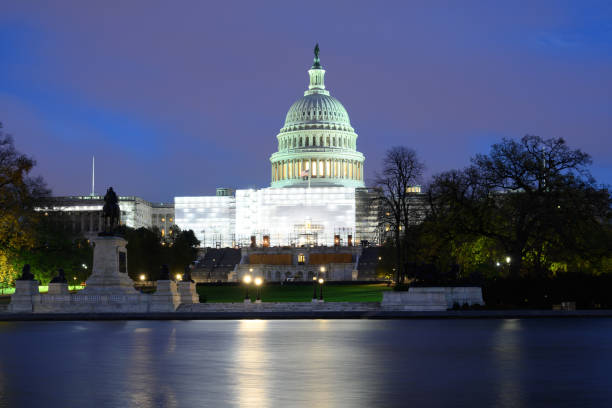 istock Sunset over the US Capitol 1450068575