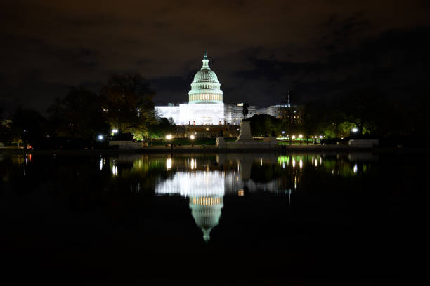 istock The US Capitol at night 1450068580