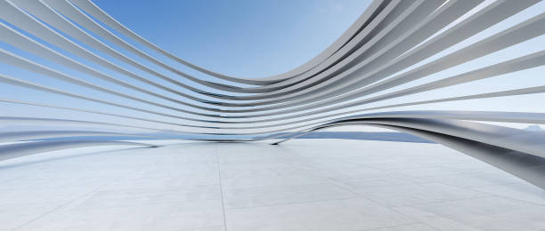 istock Modern concrete empty spaces, floors, and walls are oval-swaying metal structures. Background with transparent sky Industrial. Concept modern building structure to place the product. 3D rendering 1450069591
