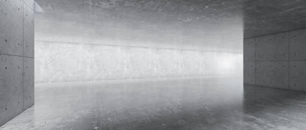 istock modern concrete room space, floor, wall, and ceiling are concrete structures, empty rooms with wall background. Concept industrial space and building structures place products. 3D rendering 1450069596