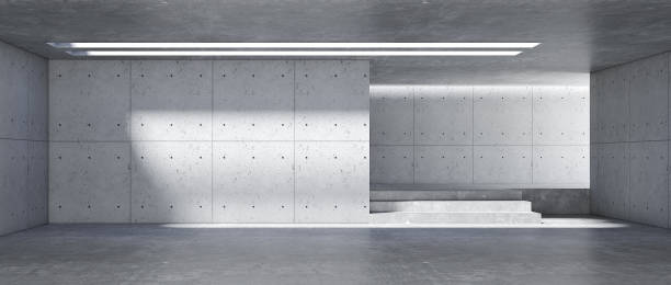 istock modern concrete room space, floor, wall, and ceiling are concrete structures, empty rooms with wall background. Concept industrial space and building structures place products. 3D rendering 1450069634