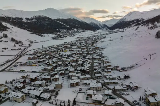 Photo of Town of Livigno in winter. Livigno landscapes in Lombardy, Italy, located in the Italian Alps, near the Swiss border.